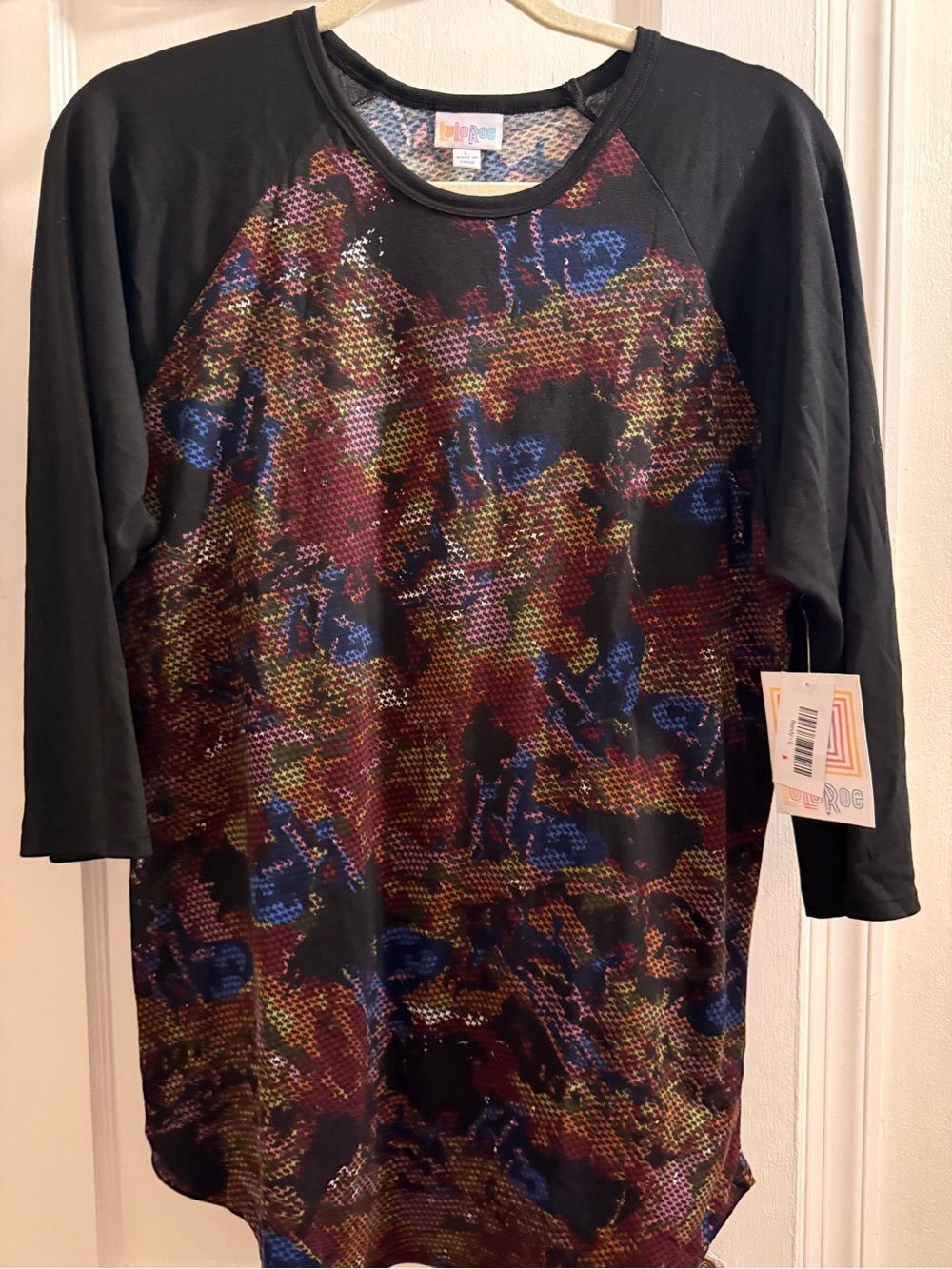 LuLaRoe Multicolor Logo Raglan - Black Trim with Pink, Blue, Gold Pattern